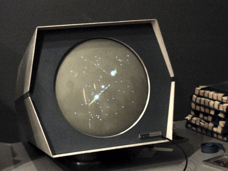 Spacewar! on PDP-1 with white/amber phosphor display